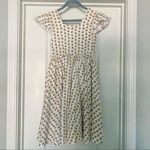 Alice & Ames Sunday Dress with mustard yellow flowers.